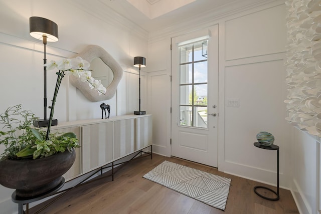 7019 Bolton St, Franklin, TN 37064 - entrance foyer with wood finished floors, crown molding, and a decorative wall