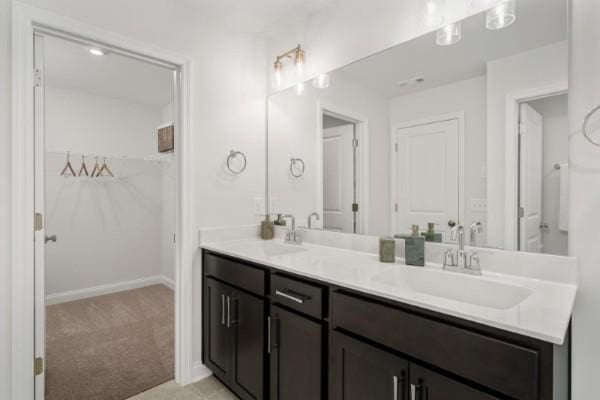2202 Melk Ln, Columbia, TN 38401 - full bathroom featuring double vanity and a spacious closet