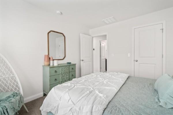 2202 Melk Ln, Columbia, TN 38401 - bedroom with carpet floors and baseboards