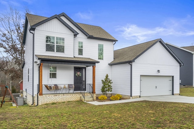 2015 Morgan Ct, Springfield, TN 37172 - view of front facade with a porch, roof with shingles, and a front yard