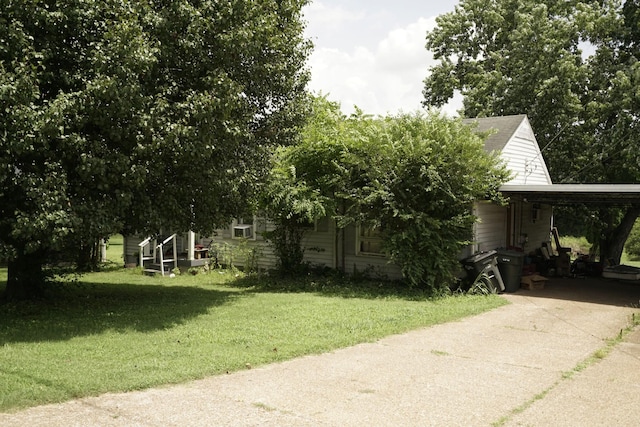 4252 Woods St, Old Hickory, TN 37138 - view of front of home featuring a carport, driveway, and a front lawn