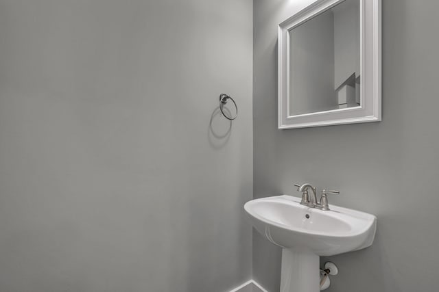 4029 Viola Ln, Franklin, TN 37069 - bathroom featuring a sink and baseboards