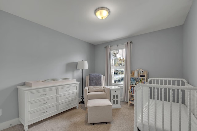 4029 Viola Ln, Franklin, TN 37069 - bedroom with light carpet and a crib
