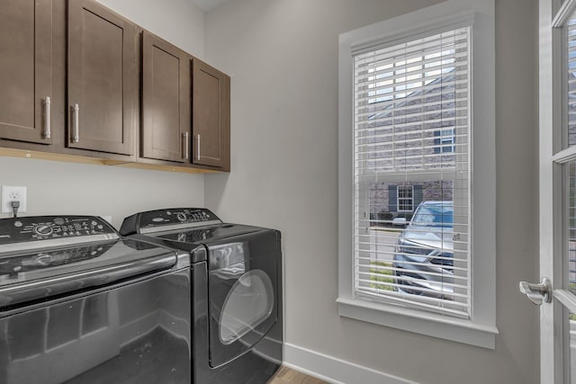 4029 Viola Ln, Franklin, TN 37069 - washroom with separate washer and dryer and cabinet space