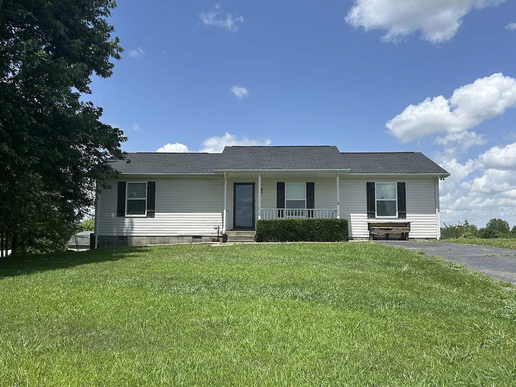 5208 Drake Rd, Cedar Hill, TN 37032 - view of front of house with covered porch, a front yard, asphalt driveway, and crawl space