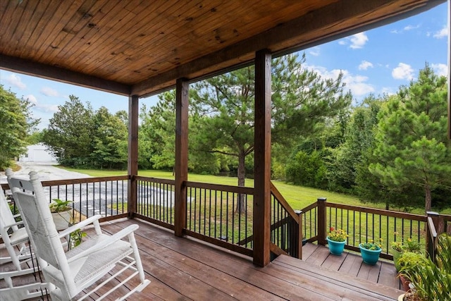 2006 Goodrich Rd, Nunnelly, TN 37137 - wooden terrace featuring a lawn and view of wooded area