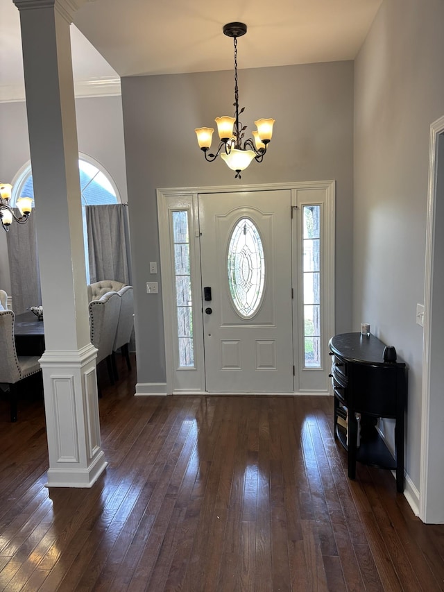 809 Renaissance Ave, Murfreesboro, TN 37129 - foyer featuring a chandelier, dark wood-style flooring, ornate columns, and a high ceiling