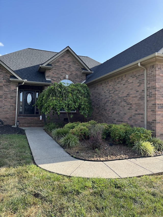 809 Renaissance Ave, Murfreesboro, TN 37129 - view of front of home featuring brick siding, a shingled roof, and a front yard