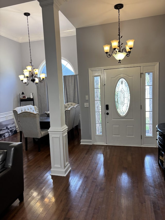809 Renaissance Ave, Murfreesboro, TN 37129 - foyer with a chandelier, dark wood finished floors, ornate columns, and crown molding