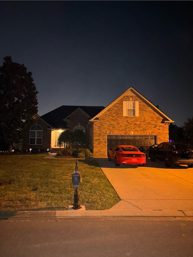 809 Renaissance Ave, Murfreesboro, TN 37129 - view of front of house with concrete driveway, a yard, and an attached garage