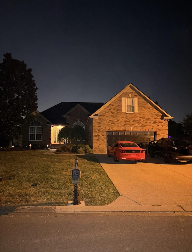 809 Renaissance Ave, Murfreesboro, TN 37129 - view of front of home featuring concrete driveway, a lawn, and an attached garage