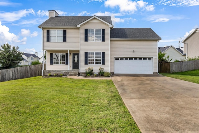 1373 Mackenzie Ct, Clarksville, TN 37042 - traditional home with concrete driveway, a chimney, and covered porch