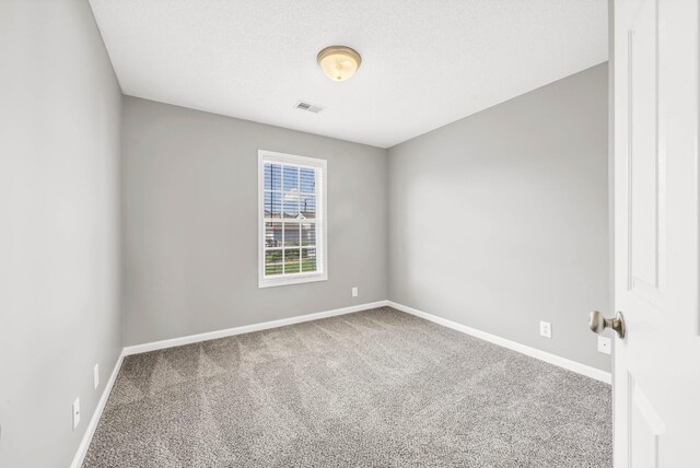 1373 Mackenzie Ct, Clarksville, TN 37042 - carpeted empty room with baseboards