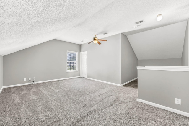 1373 Mackenzie Ct, Clarksville, TN 37042 - additional living space with lofted ceiling, carpet flooring, ceiling fan, and a textured ceiling