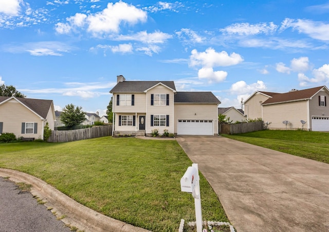 1373 Mackenzie Ct, Clarksville, TN 37042 - view of front of home with concrete driveway, a garage, and a chimney
