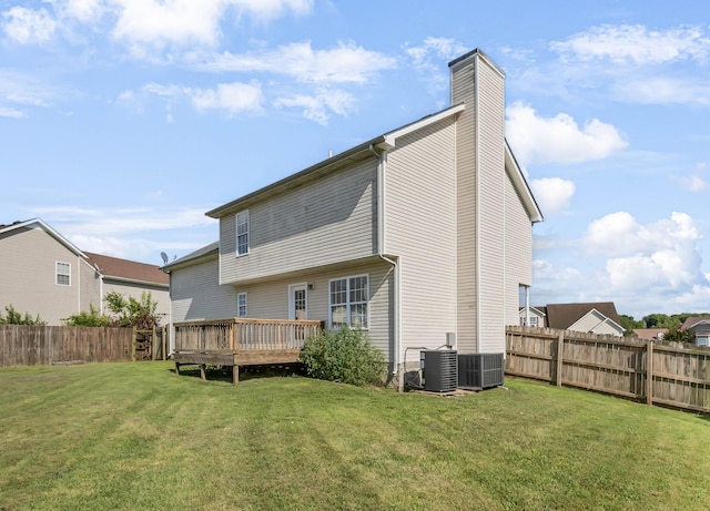 1373 Mackenzie Ct, Clarksville, TN 37042 - rear view of house featuring a fenced backyard, a chimney, and a wooden deck