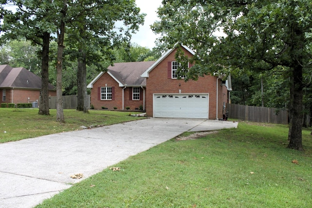 109 Hunter Dr, Mount Juliet, TN 37122 - view of front of home with an attached garage, brick siding, and concrete driveway