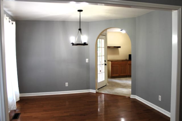 109 Hunter Dr, Mount Juliet, TN 37122 - spare room with arched walkways and wood finished floors