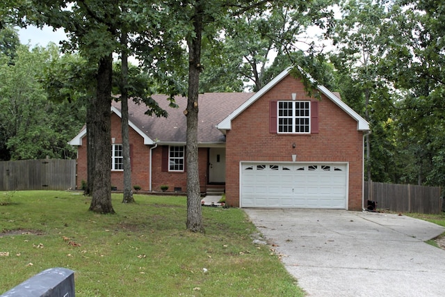 109 Hunter Dr, Mount Juliet, TN 37122 - view of front facade featuring concrete driveway, brick siding, a garage, and a shingled roof