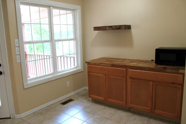 109 Hunter Dr, Mount Juliet, TN 37122 - home office with baseboards and light tile patterned floors