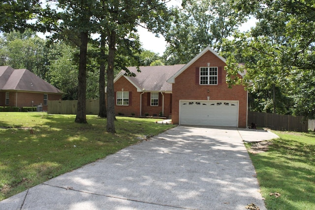 109 Hunter Dr, Mount Juliet, TN 37122 - view of front of house with concrete driveway, brick siding, and a garage