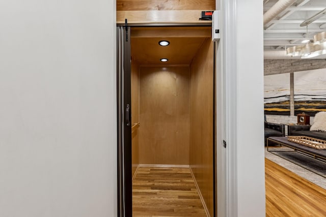 320 Liberty Pike Unit 205, Franklin, TN 37064 - elevator featuring wood finished floors