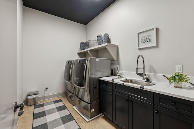 320 Liberty Pike Unit 205, Franklin, TN 37064 - laundry room with independent washer and dryer, cabinet space, and light tile patterned flooring
