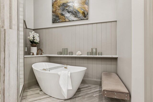 320 Liberty Pike Unit 205, Franklin, TN 37064 - full bath featuring a soaking tub and wood finished floors