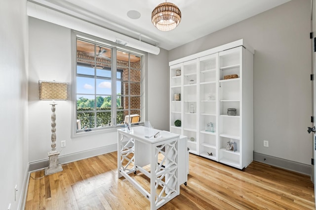 320 Liberty Pike Unit 205, Franklin, TN 37064 - office space featuring light wood finished floors and a chandelier