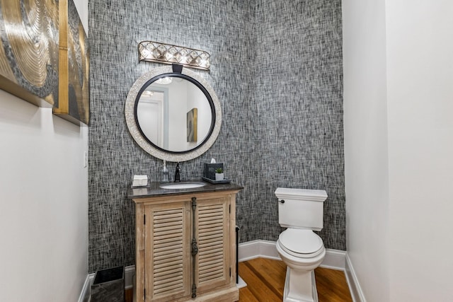 320 Liberty Pike Unit 205, Franklin, TN 37064 - half bathroom with vanity and wood finished floors