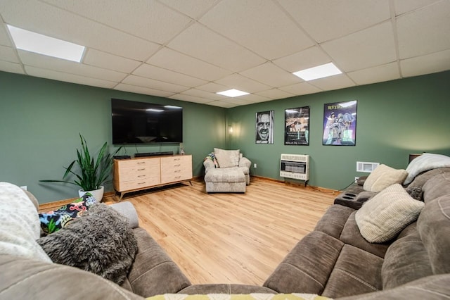 3205 Rocky Point Ln, Stewart, TN 37175 - living room with heating unit, a drop ceiling, and wood finished floors