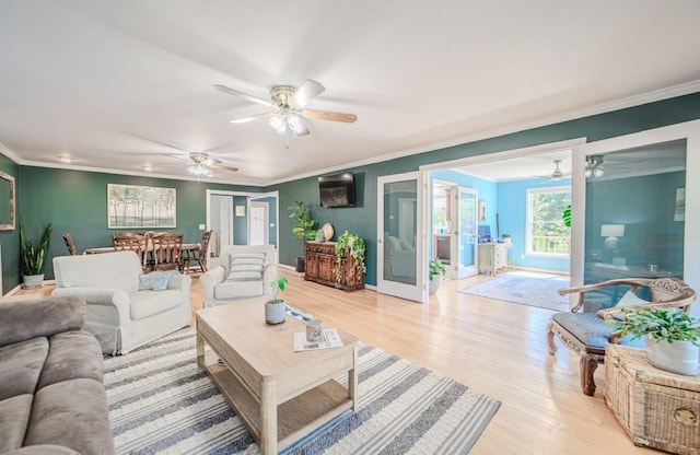 3205 Rocky Point Ln, Stewart, TN 37175 - living area featuring ornamental molding, ceiling fan, and light wood-style floors