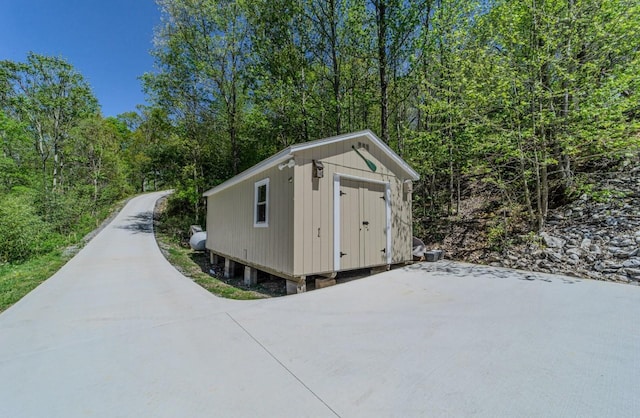 3205 Rocky Point Ln, Stewart, TN 37175 - view of shed with a view of trees