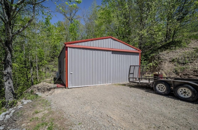 3205 Rocky Point Ln, Stewart, TN 37175 - detached garage featuring a wooded view