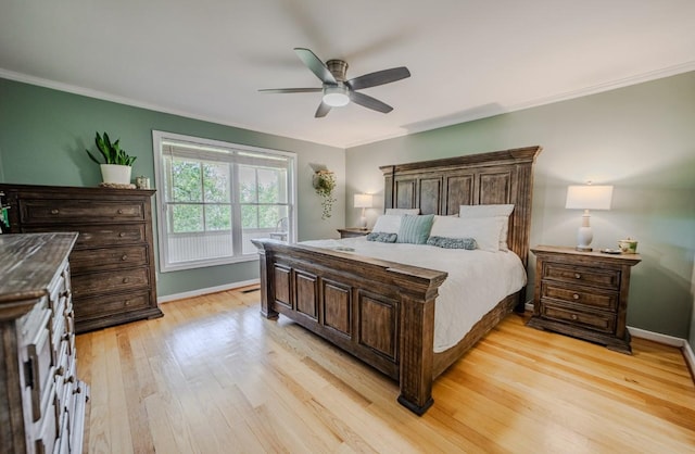 3205 Rocky Point Ln, Stewart, TN 37175 - bedroom with light wood finished floors, ceiling fan, and crown molding