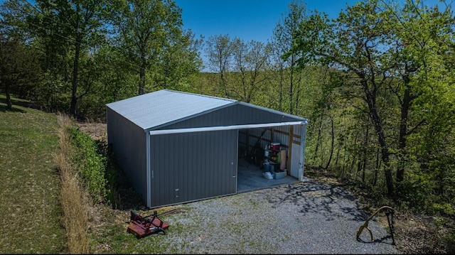 3205 Rocky Point Ln, Stewart, TN 37175 - view of pole building with a view of trees