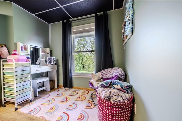 3205 Rocky Point Ln, Stewart, TN 37175 - bedroom with multiple windows and wood finished floors