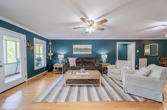 3205 Rocky Point Ln, Stewart, TN 37175 - living area with a ceiling fan, wood finished floors, and crown molding