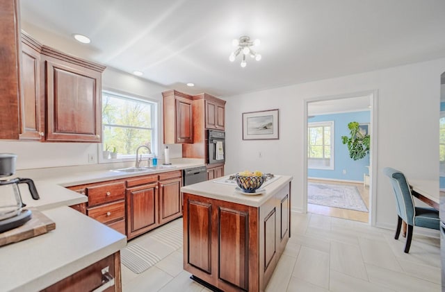 3205 Rocky Point Ln, Stewart, TN 37175 - kitchen with light countertops, oven, stovetop, a kitchen island, and recessed lighting