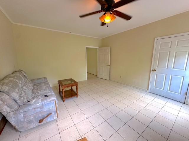 104 Tobaccoport Dock Rd, Bumpus Mills, TN 37028 - living area with ceiling fan, light tile patterned floors, and crown molding