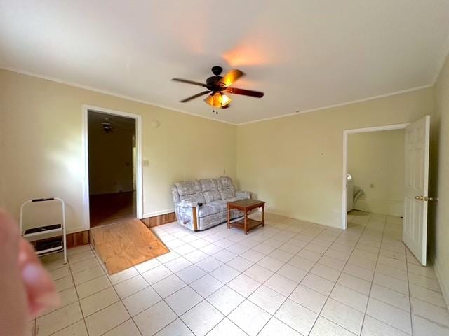 104 Tobaccoport Dock Rd, Bumpus Mills, TN 37028 - living area featuring a ceiling fan, light tile patterned floors, and ornamental molding