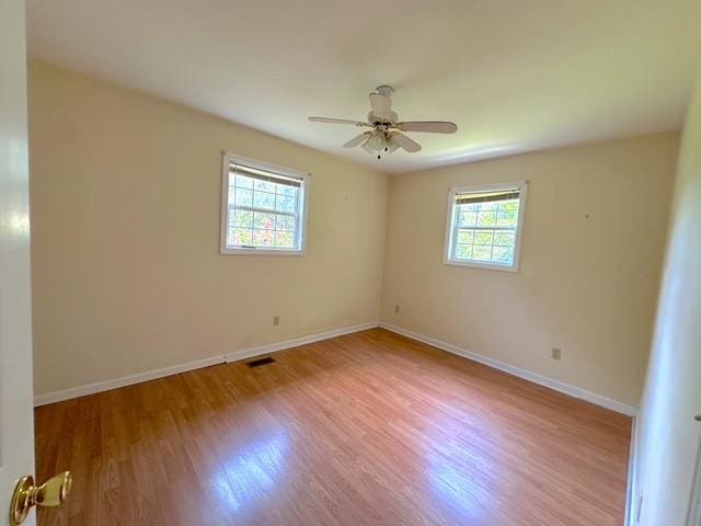 104 Tobaccoport Dock Rd, Bumpus Mills, TN 37028 - unfurnished room with wood finished floors and a ceiling fan