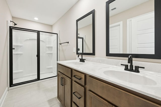 145 Irish Hls, Clarksville, TN 37042 - bathroom featuring a shower stall, double vanity, and tile patterned floors