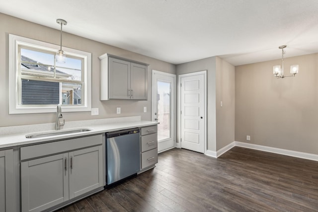 148 Irish Hls, Clarksville, TN 37042 - kitchen featuring dishwasher, gray cabinets, dark wood-type flooring, a chandelier, and light countertops