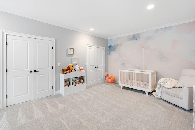 4220 Kirtland Rd, Nashville, TN 37215 - bedroom featuring two closets, crown molding, carpet flooring, recessed lighting, and a nursery area