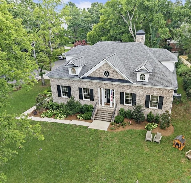 4220 Kirtland Rd, Nashville, TN 37215 - view of front of home featuring a front lawn, roof with shingles, and a chimney