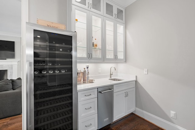 4220 Kirtland Rd, Nashville, TN 37215 - indoor wet bar featuring wine cooler and dark wood-type flooring