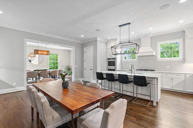 4220 Kirtland Rd, Nashville, TN 37215 - dining space featuring plenty of natural light, dark wood-style floors, recessed lighting, and crown molding