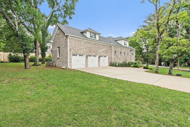 4220 Kirtland Rd, Nashville, TN 37215 - view of side of home featuring brick siding, concrete driveway, a yard, and a garage