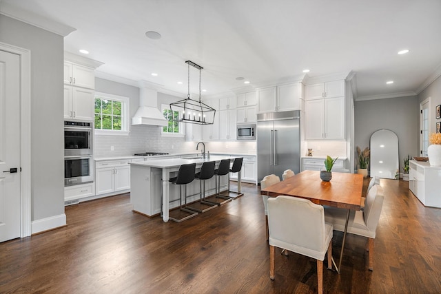 4220 Kirtland Rd, Nashville, TN 37215 - dining room featuring ornamental molding, recessed lighting, and dark wood-style floors